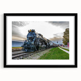 Extra large abstract art print of a colorful, textured train on a black framed canvas, ideal for living room decor.
