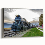 Framed canvas of a vintage train in motion, featuring a landscape background in muted earth tones, ideal for office decor.