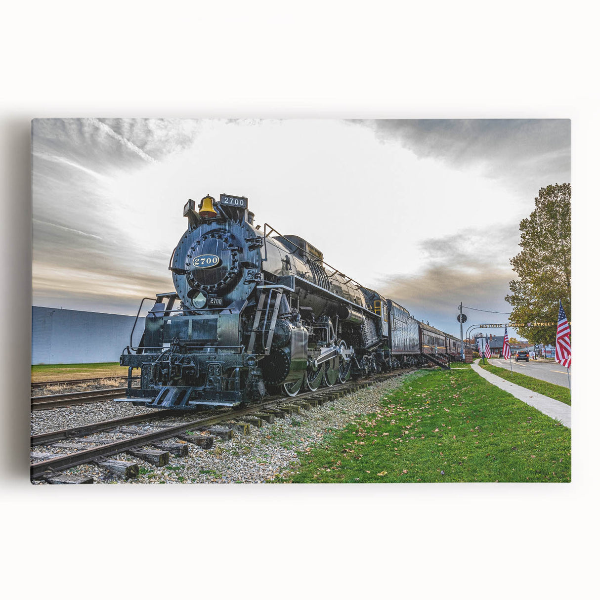 Black and white photo of a vintage train on stretched canvas, ideal for kitchen wall art.