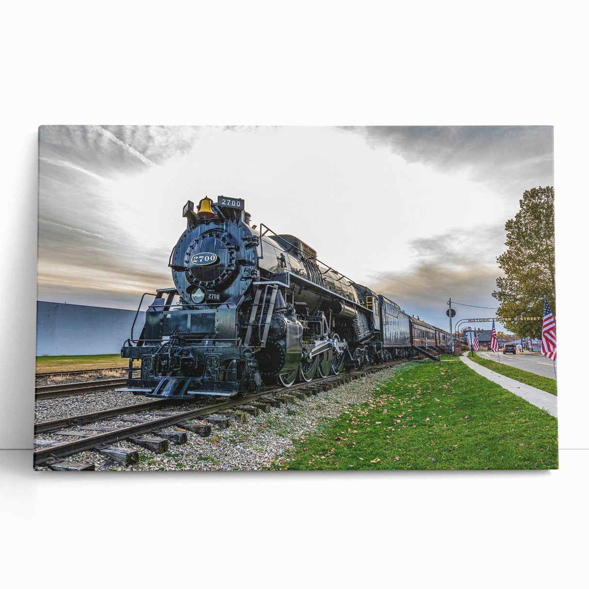 Black and white photo of a vintage train on stretched canvas, ideal for kitchen wall art or bedroom decor.