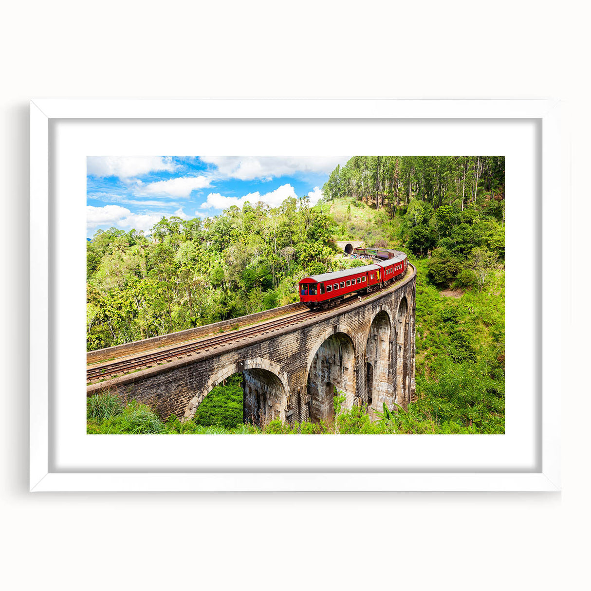 Abstract art print of a stylized train in muted grays and blues on a white framed poster, suitable for dining room decor.