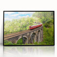 Large abstract wall art featuring a stylized train in black and white tones on a framed acrylic.