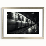 Textured art print of an abstract train design in muted gray and silver, framed with a silver mat.