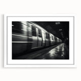 Abstract art print of a stylized train in muted gray and blue tones, framed with a white mat, suitable for dining room decor.