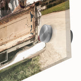 Mid-century modernist large abstract art print featuring assorted trucks, in muted browns and oranges on acrylic glass.