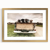 Extra large wall art featuring abstract trucks in textured shades of gray and gold, framed in gold.
