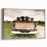 Framed canvas featuring a vintage poster art of colorful trucks in a landscape setting, ideal for decorating a home office.