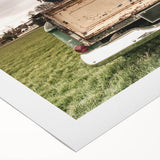 Art deco poster of vintage trucks in muted browns and creams on rolled canvas, suitable for dining room decor.