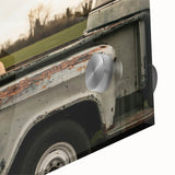 Mid-century modernist acrylic print of abstract trucks in muted earth tones, ideal for dining room art.