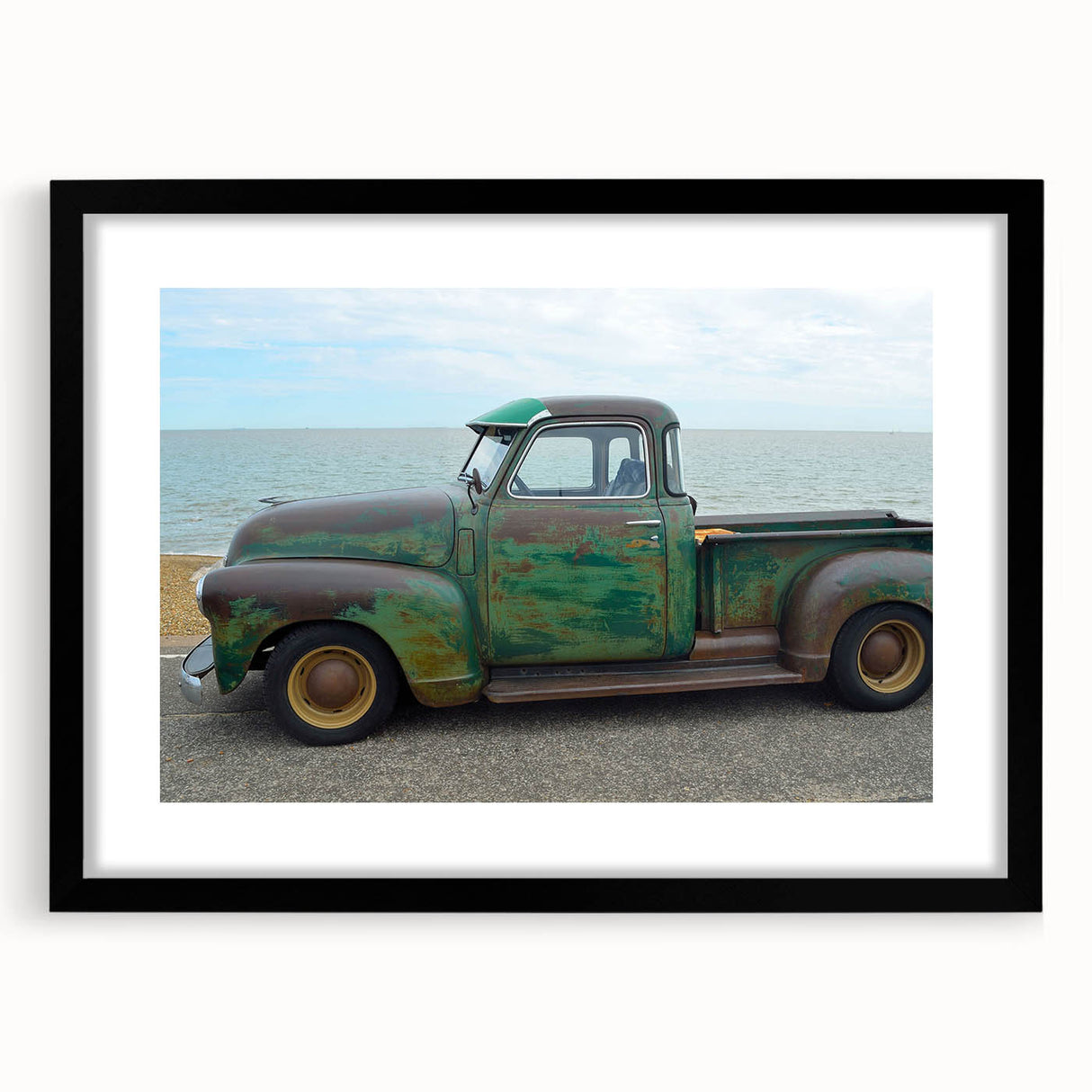 Extra large abstract art print of colorful, textured trucks on a black framed canvas, suitable for living room decor.
