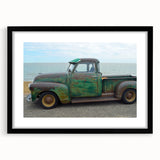 Extra large abstract art print of colorful, textured trucks on a black framed canvas, suitable for living room decor.