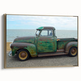 Framed canvas featuring a vintage poster of black trucks in a landscape setting, suitable for bedroom wall art.