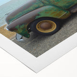 Art deco poster depicting a series of vintage trucks in muted colors on a rolled canvas, suitable for dining room decor.