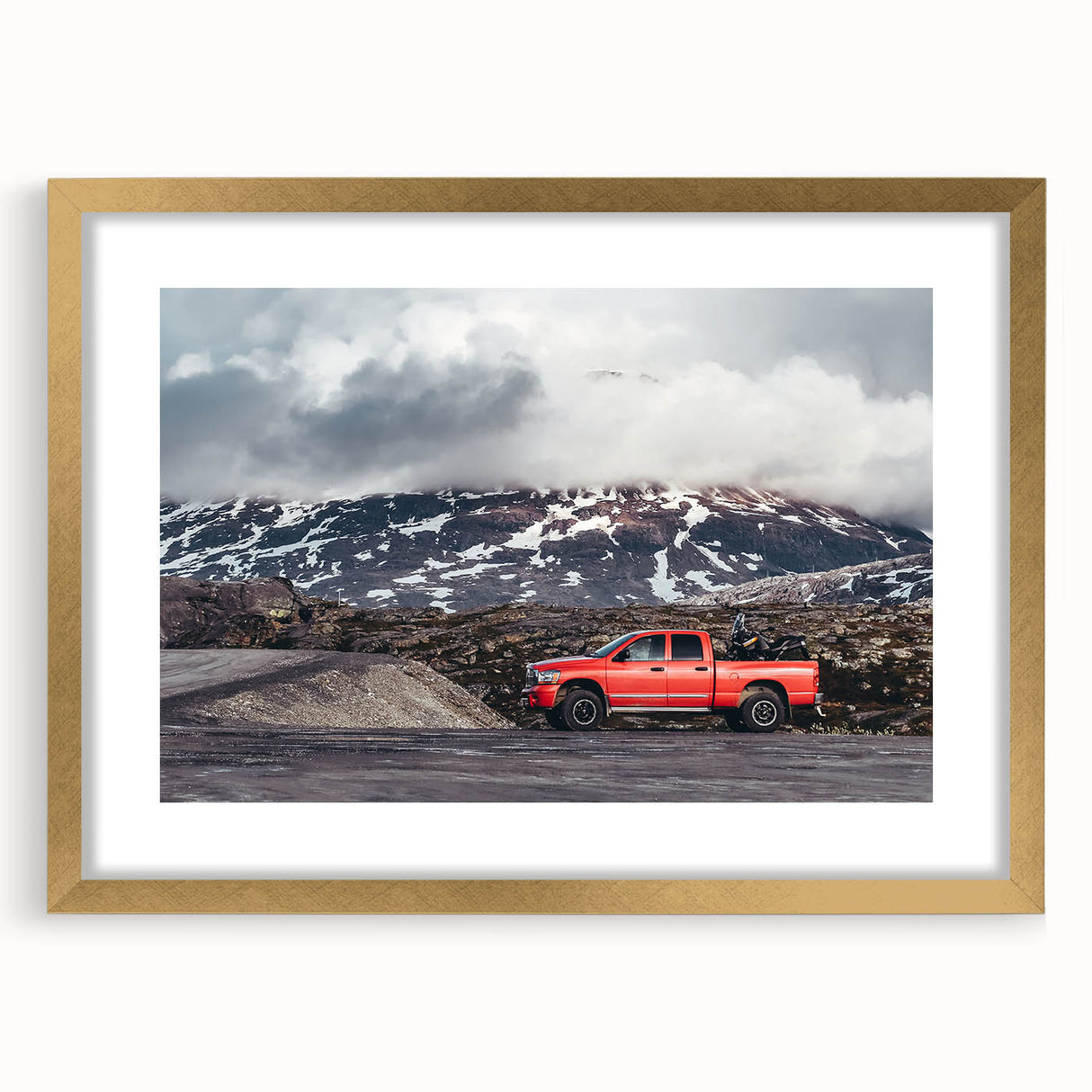 Extra large abstract art print of colorful trucks on a textured canvas, framed in gold, suitable for living room decor.