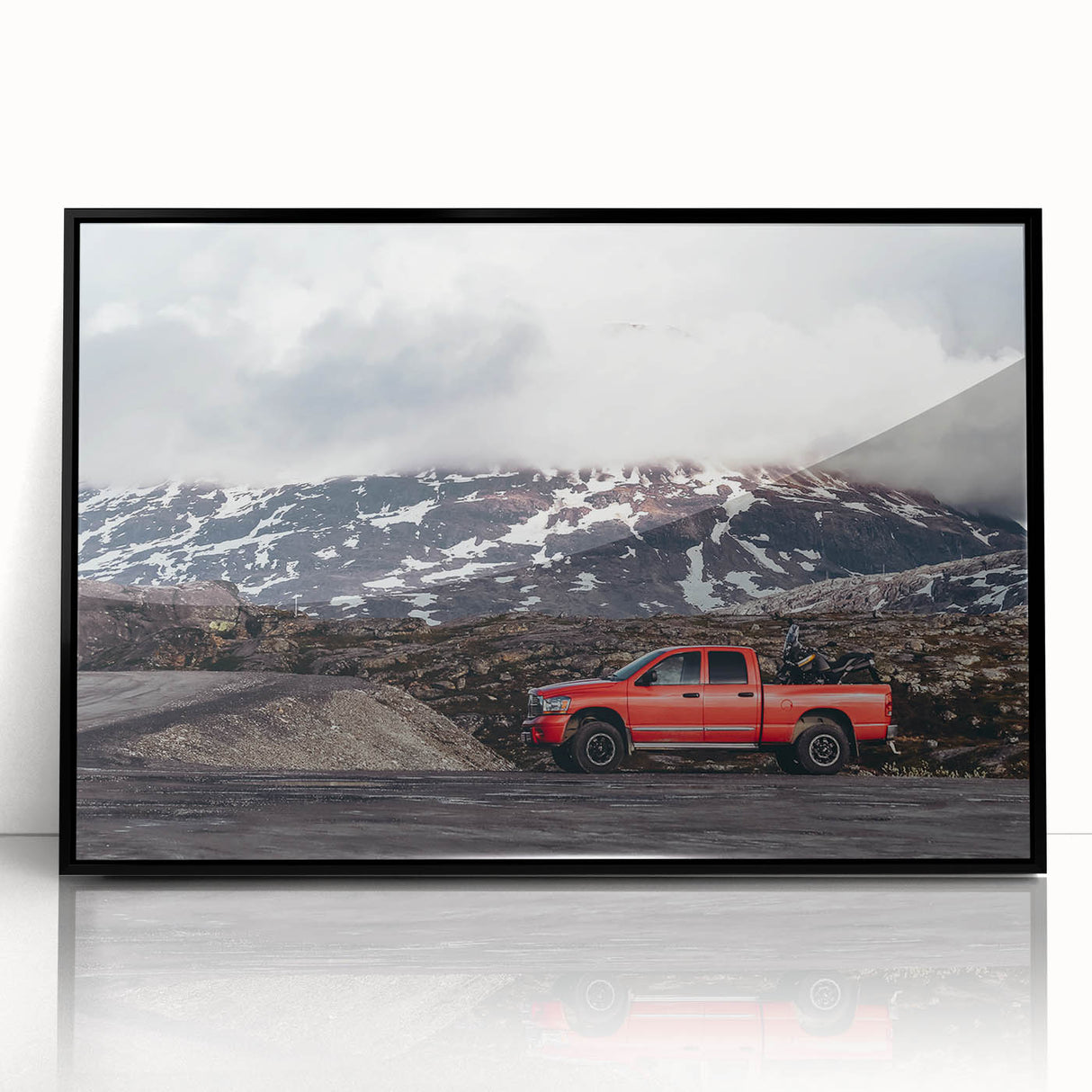Framed acrylic print of abstract trucks in muted gray and orange, ideal for modern art wall decor.