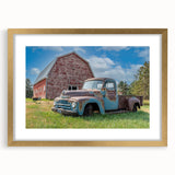 Extra large abstract art print featuring textured trucks in muted earth tones on a framed canvas.