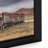 Close-up of a black framed canvas featuring colorful, textured trucks, ideal for extra large wall art in a living room.