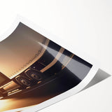 Extra large wall art featuring a line art design of trucks in black and white on a rolled print.