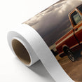 Art deco style poster featuring colorful trucks on a rolled canvas, ideal for nursery wall art.